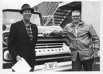 Two Men in Front of Delivery Truck by Concordia University - Portland