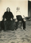 Couple sitting on chairs
