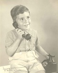 Portrait of child with telephone